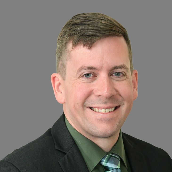 Official portrait photograph of Adam Necelis, CPA